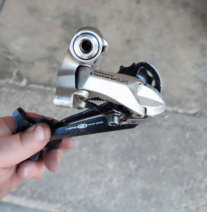 Задний переключатель Shimano DEORE LX RD-M580 GS на 9 скоростей: 1