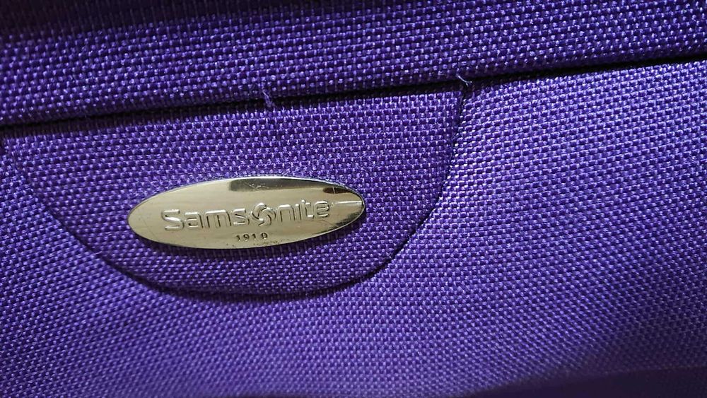 Walizka Samsonite fioletowa dwa koła jezdne