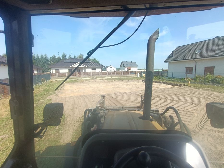 Usługi koparko-ładowarką CAT | ZIEMIA ŻWIR PIASEK POSPÓŁKA