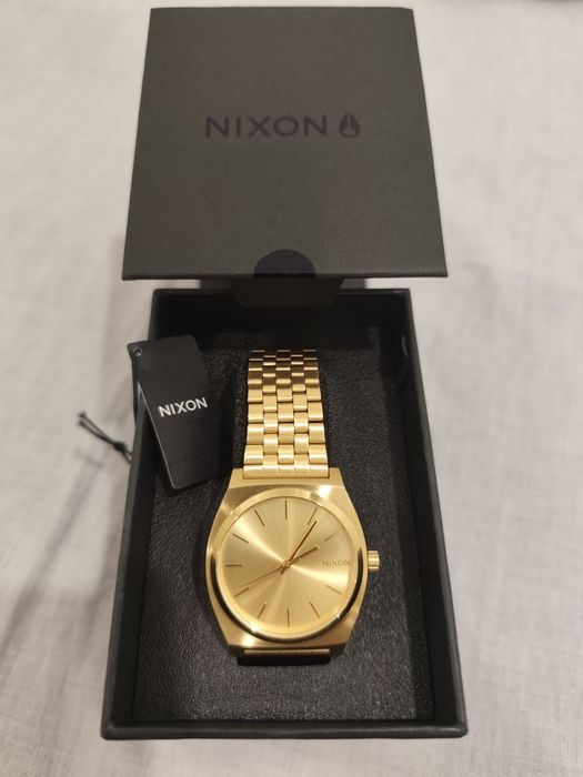 Nixon timeteller dourado novo