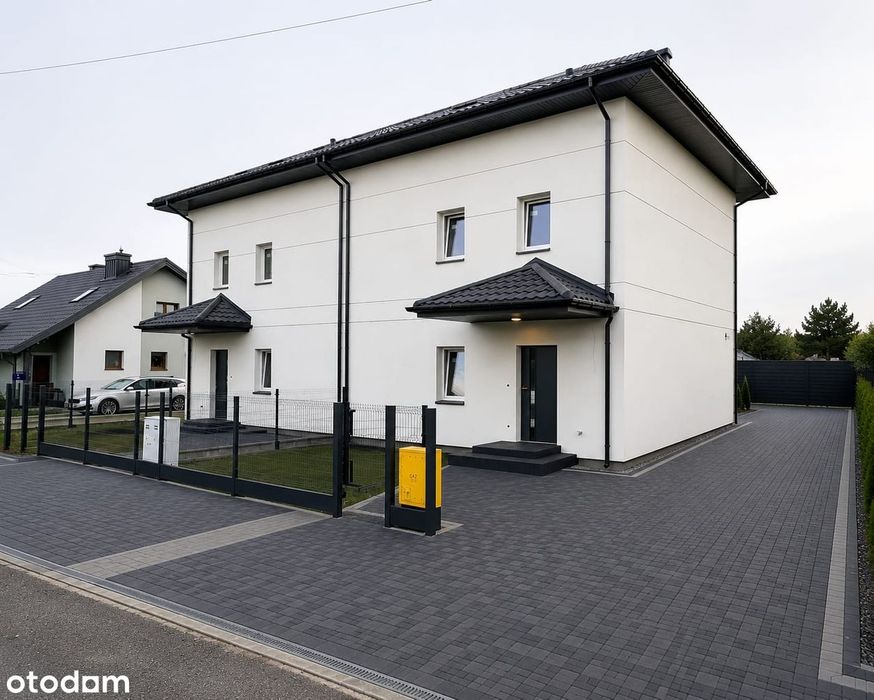 Nowoczesny dom w spokojnej , zielonej okolicy