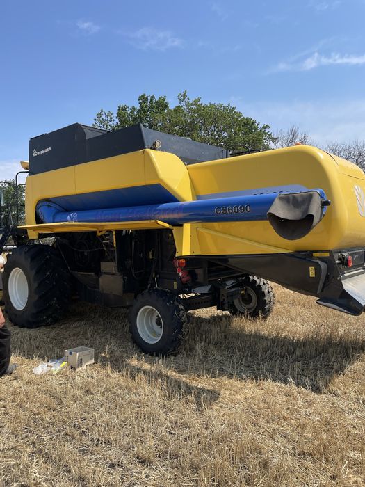 Комбаин NEW HOLLAND CS6090.( зерновая жатка)