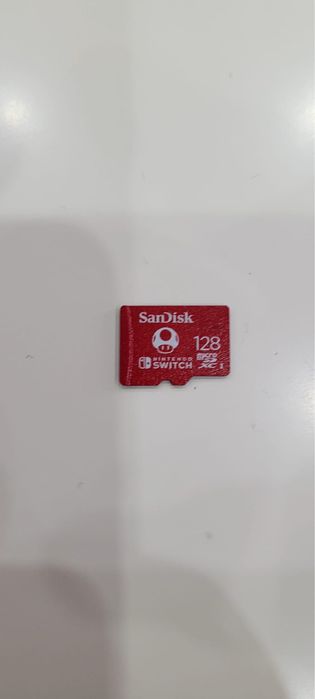 Nintendo Switch + Cartão microSD 128 GB + 2 Jogos