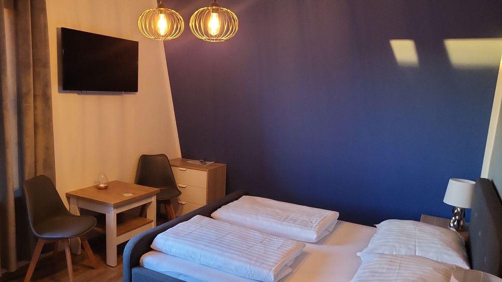 Aartamenty i pokoje z miejscem parkingowym i Jakuzzi