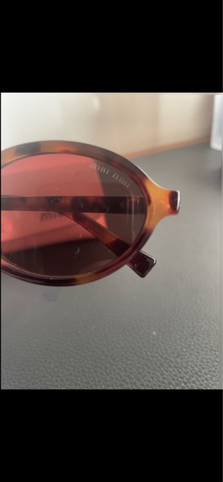 oculos miu miu muito bom estado