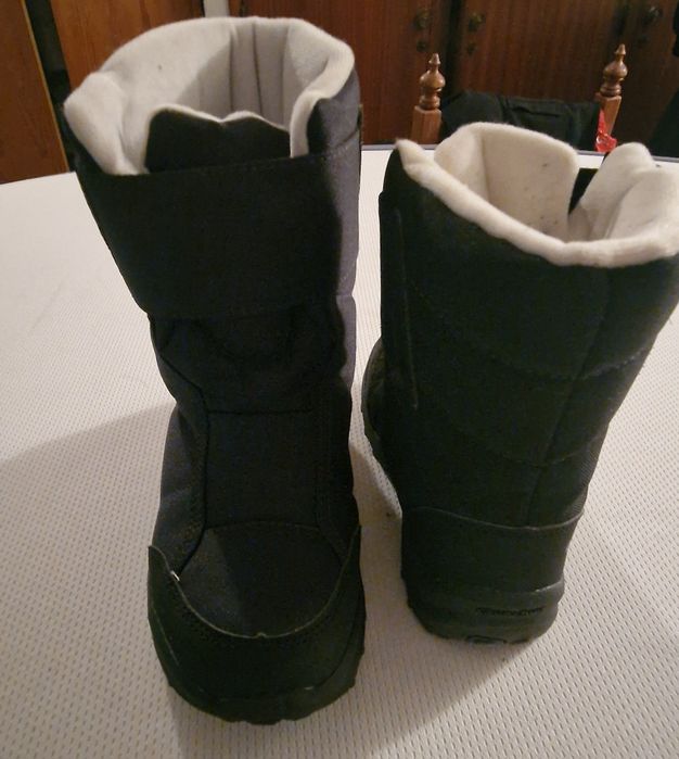 Botas de neve de criança