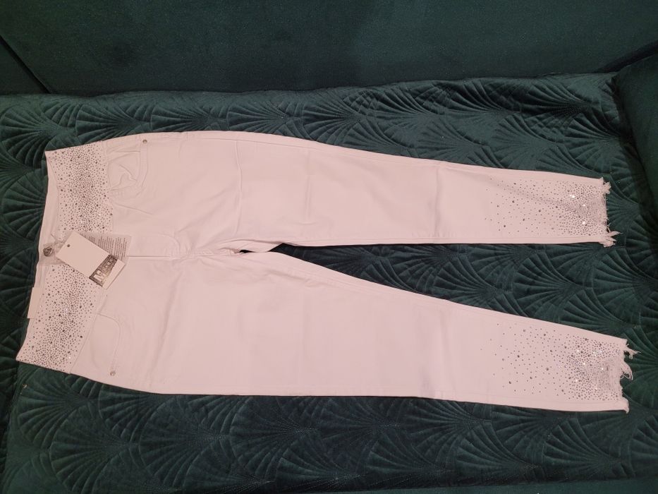 Spodnie damskie białe nowe L