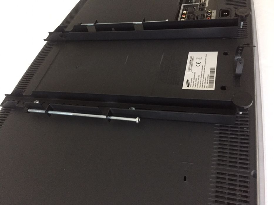 Apoio de televisão para parede, universal