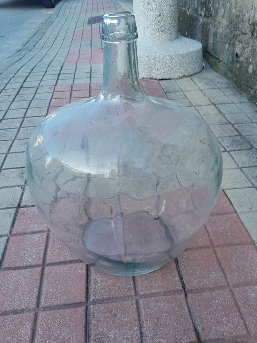 Garrafão  de vidro.