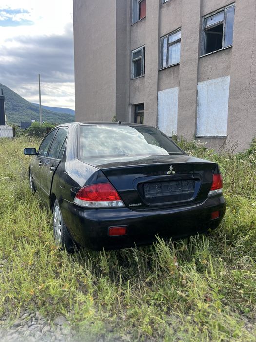 Розбірка mitsubishi lancer 9 1.6 запчастини дверь кпп двигун чвертт