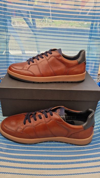 Tenis em pele novo