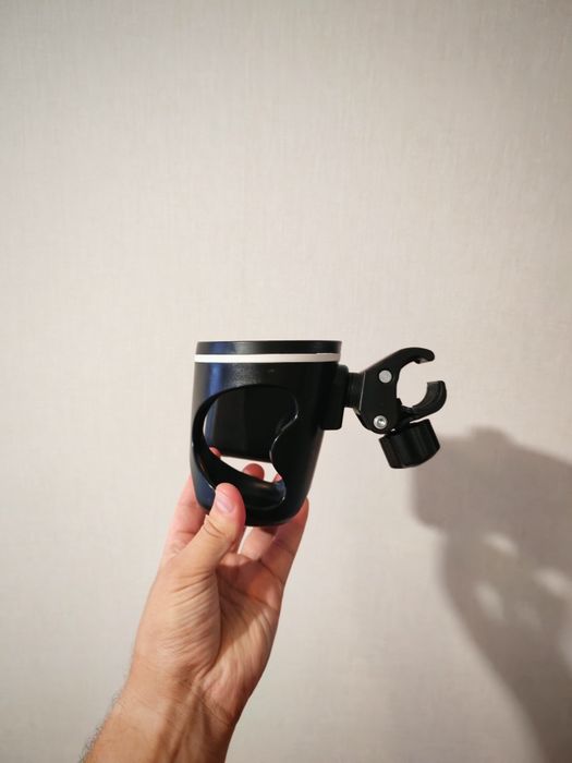 Універсальний підстаканник жля дитячої коляски  з місцем для смартфона