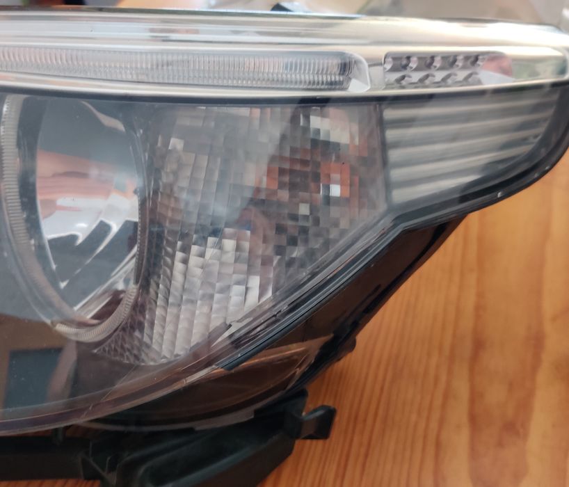 Ótica/Farol esquerdo BMW (E61)
