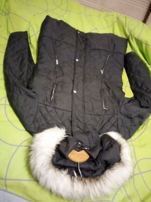 Пуховик женский 50размер 1500гривен торг