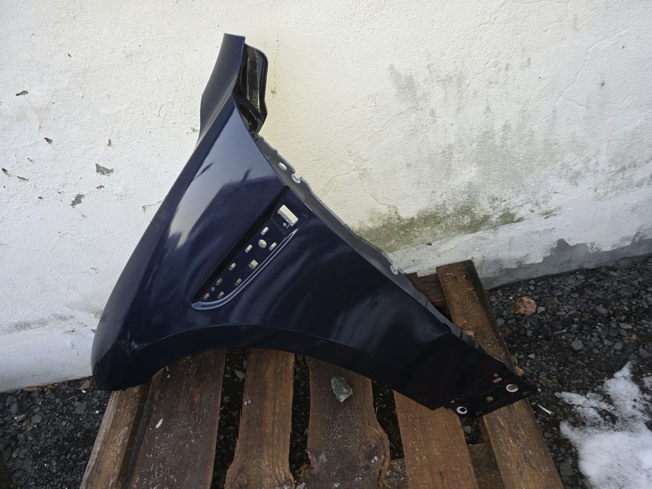 Blotnik Jaguar XF lewa strona orginalny