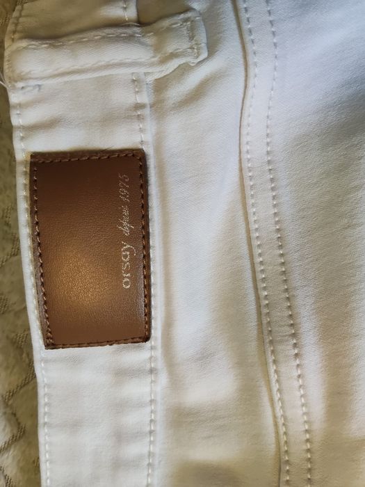 Białe jeansy damskie Orsay rozmiar 38