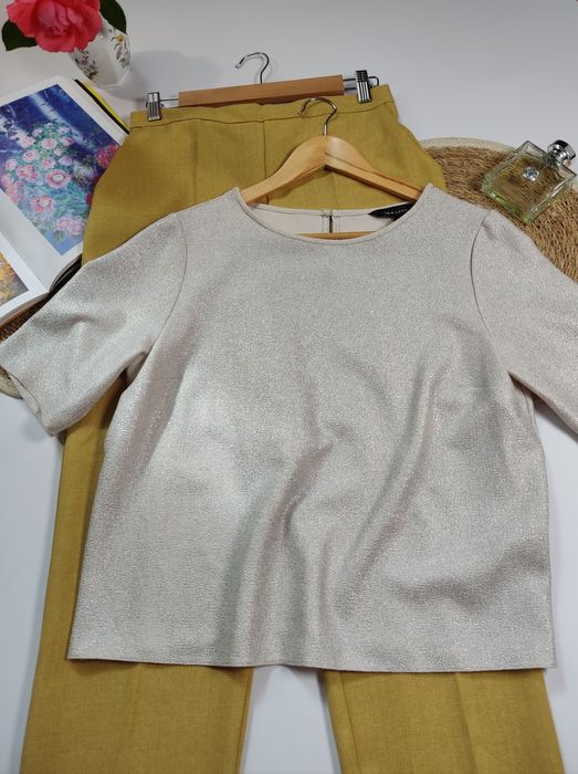 Блискуча блуза вільного крою в розмірі М