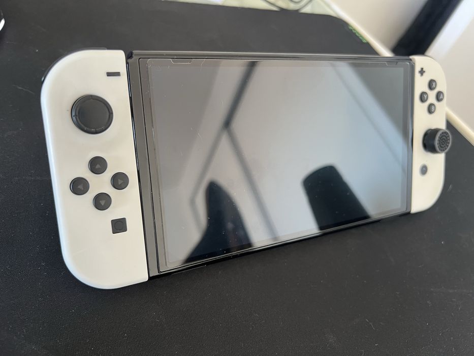 Switch OLED com extras + Wii Sports