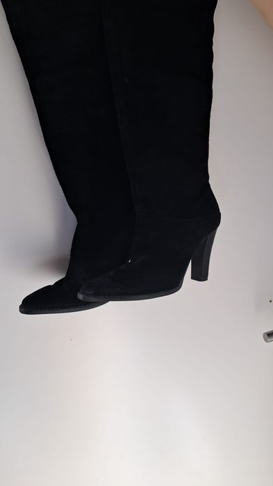 Botas de tacão e cano alto
