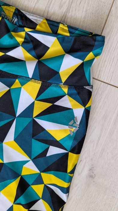 Wielokolorowe leginsy z kieszonką na zamek Crivit S 36