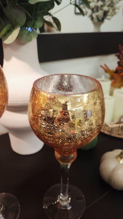 Castiçais lindíssimos em tons dourados