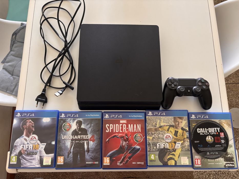 Vendo PS4 Slim de 1 TB + Comando original PS4 + Jogos