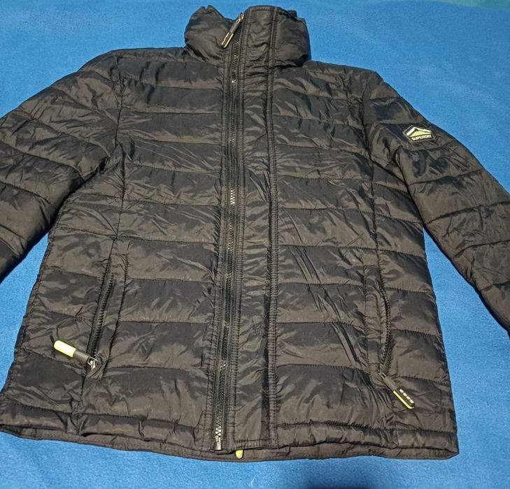 Blusão quente em bom estado com bolsas com fecho64741029445763122