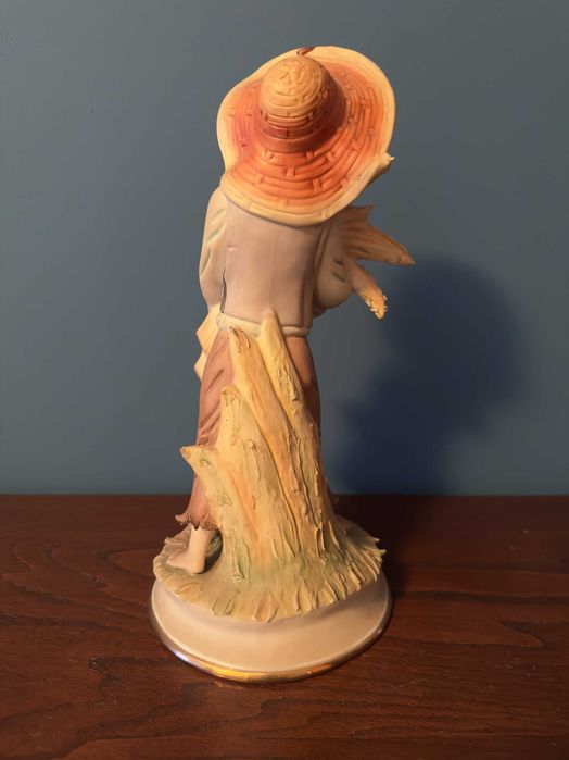 Estatua Pessoa no campo