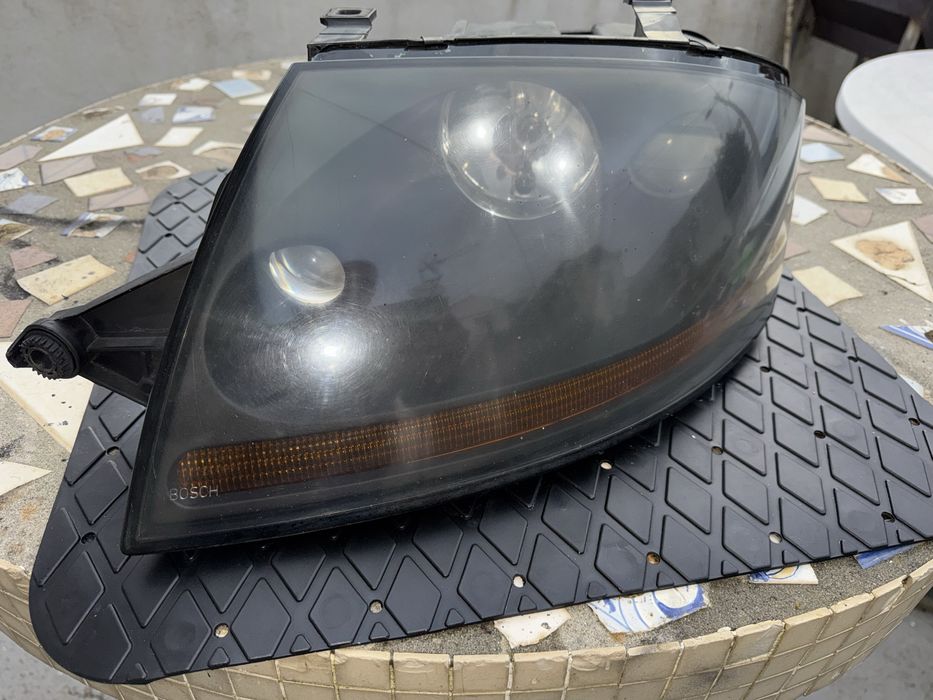 Oticas farol audi tt esquerda uma marca bosch
