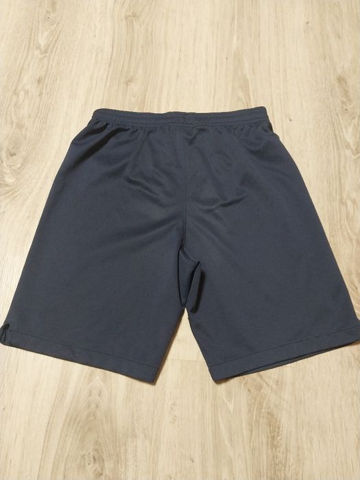 Granotowe spodenki  Nike