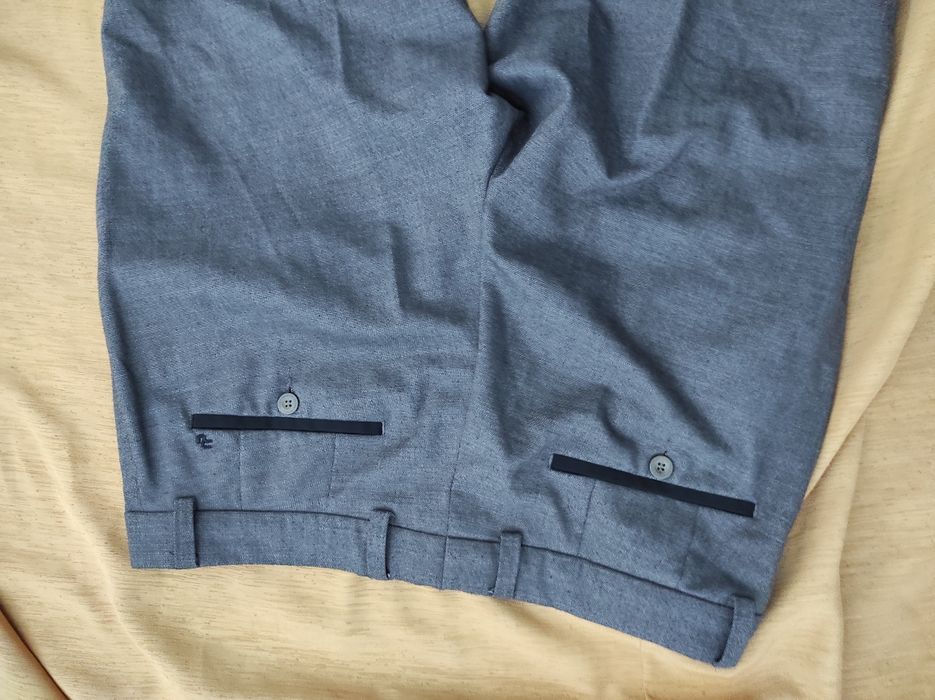 Świetne spodnie garniturowe eleganckie Remus Uomo W34L31 pas 86cm