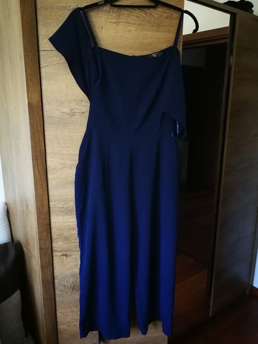 Elegancki kombinezon granatowy z szerokimi nogawkami