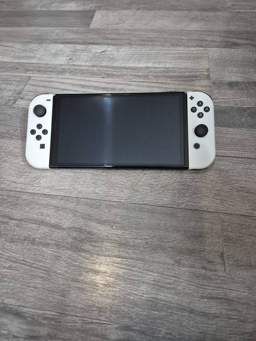 Nintendo SWITCH  OLED новий+гра