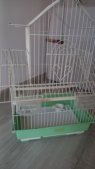 Gaiola pássaros com poleiro