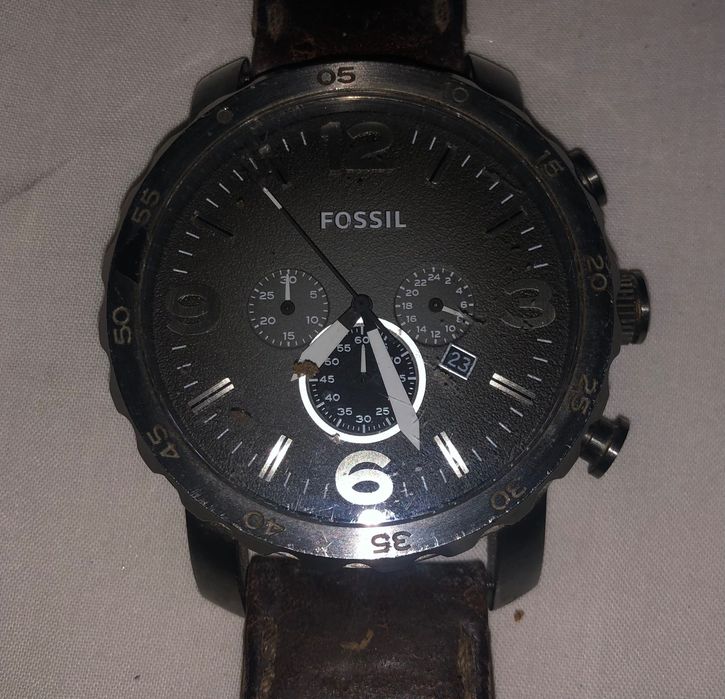 Relógio fóssil impecável