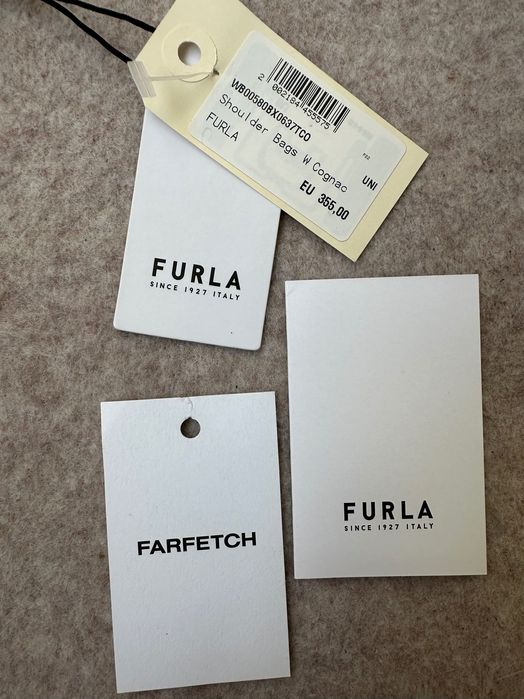 Стильна плетена сумка від furla — ідеальний акцент на літо
