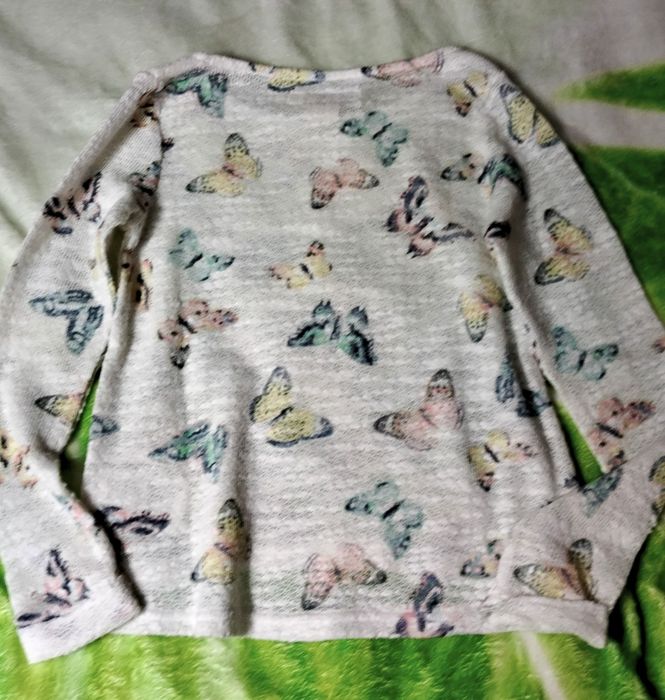 Sweterek w motyle H M rozmiar 122/128