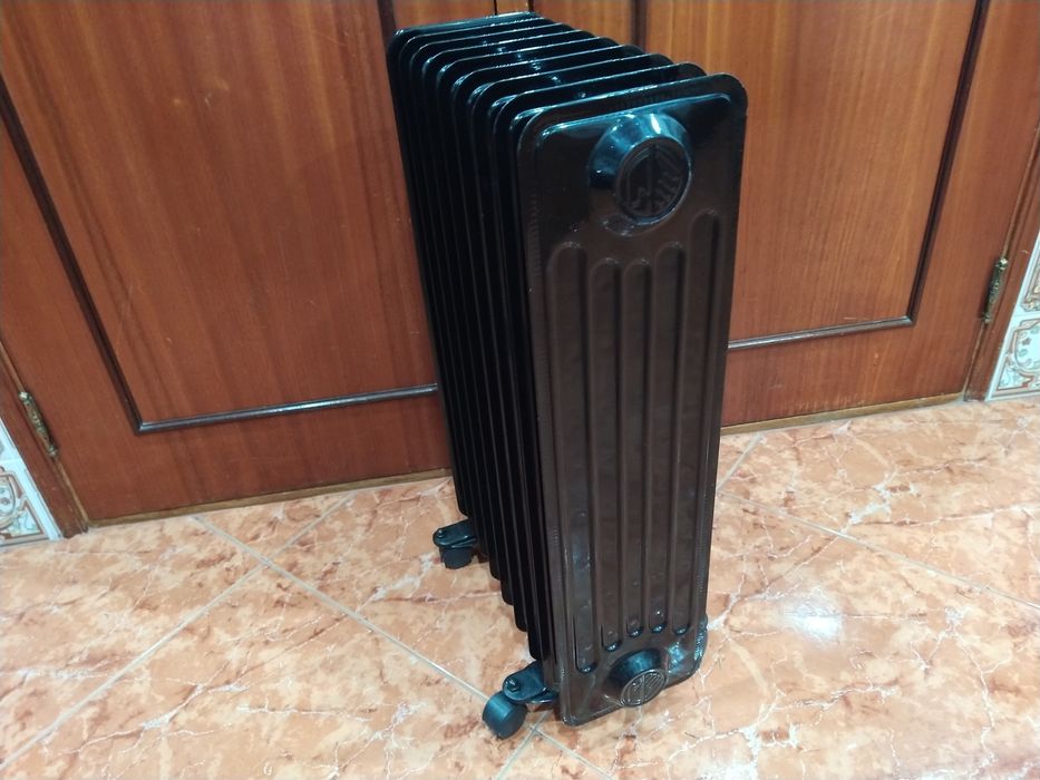 Aquecedor radiador a óleo casa quarto apartamento vivenda escritório gabinete cozinha.