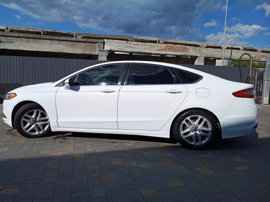 Ford Fusion 2016 VIN 3FA6P0H79GR380821 фото оголошення 3 з 10