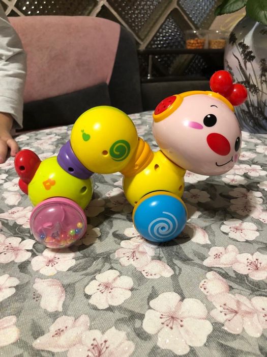 Развивающая музыкальная игрушка - каталка HOLA