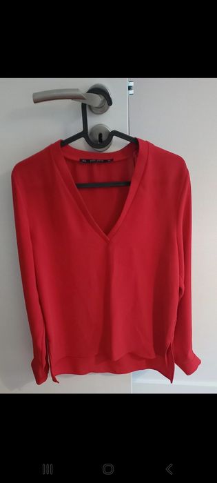 Blusa vermelha para mulher.