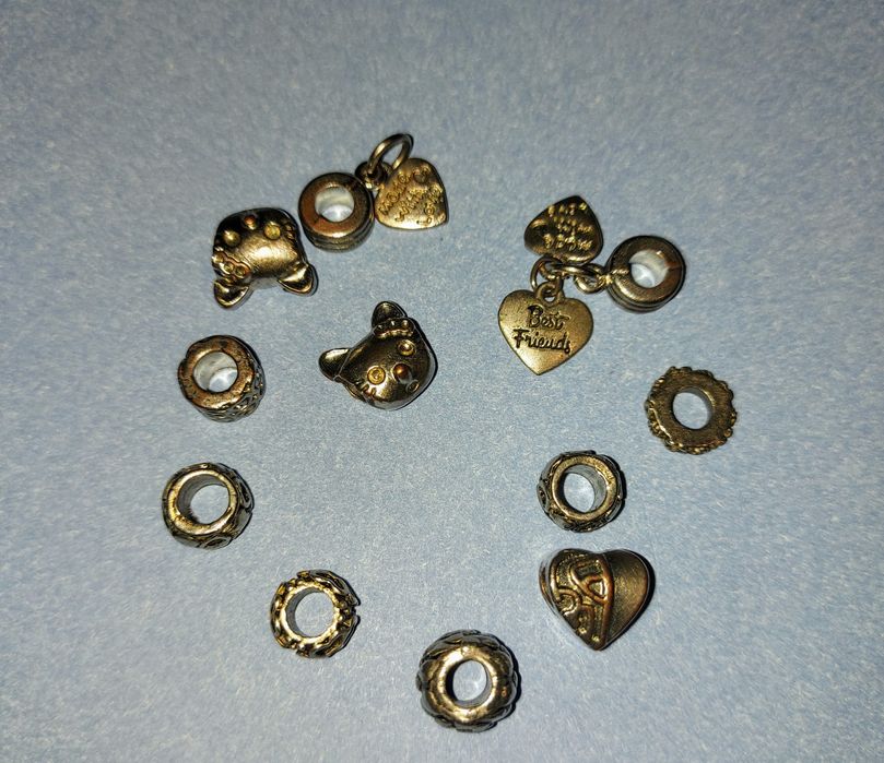 Charmsy- 11 sztuk w kolorze srebra