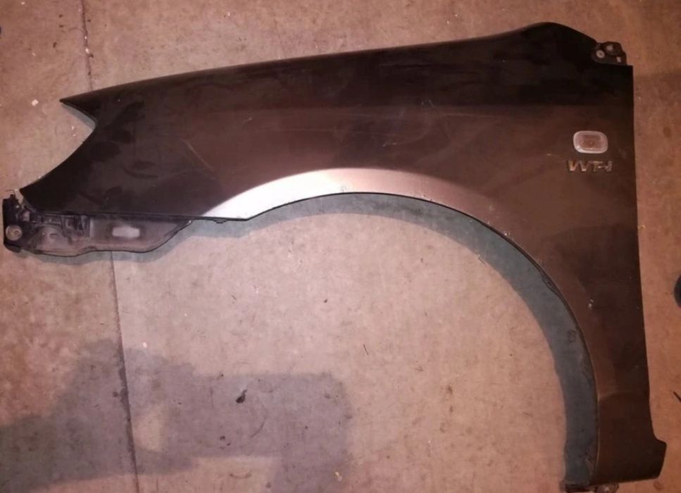 Błotnik lewy przód Toyota Corolla E12 Kombi / Seda