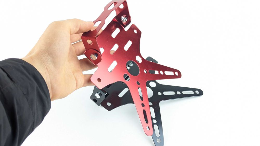 Універсальне Х-кріплення для мото номера з регулюванням кута