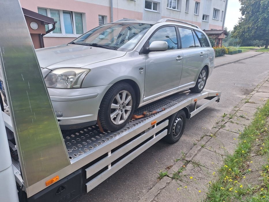 Auto holowanie laweta pomoc drogowa holowanie transport