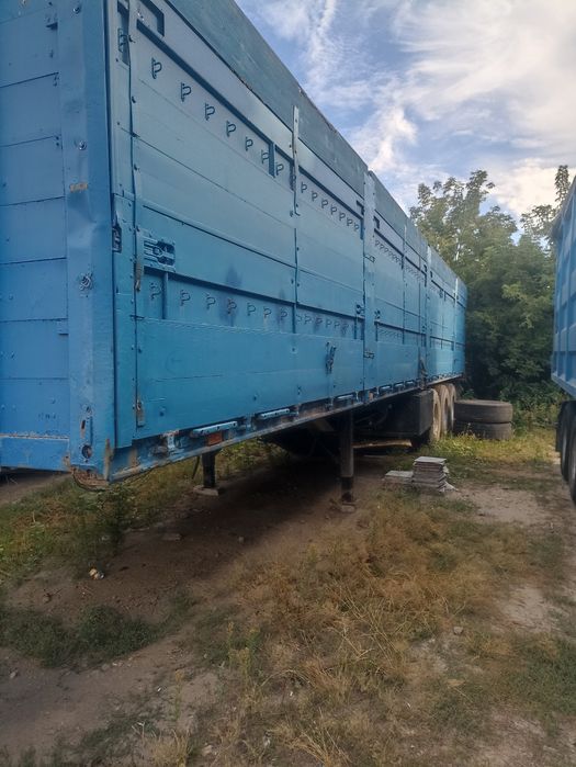 Напівпричіп бортовий тентований зерновоз