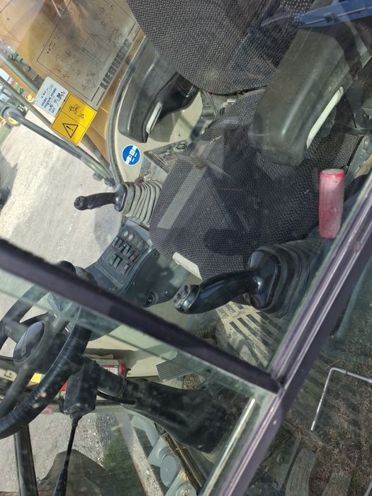 Koparka CASE WX120 Liebherr 314