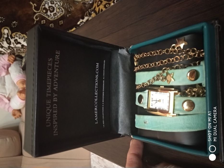 Женские фирменные часы