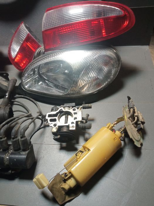 Lanos rozrusznik lampy cewka dolot pompka przepustnica półka
