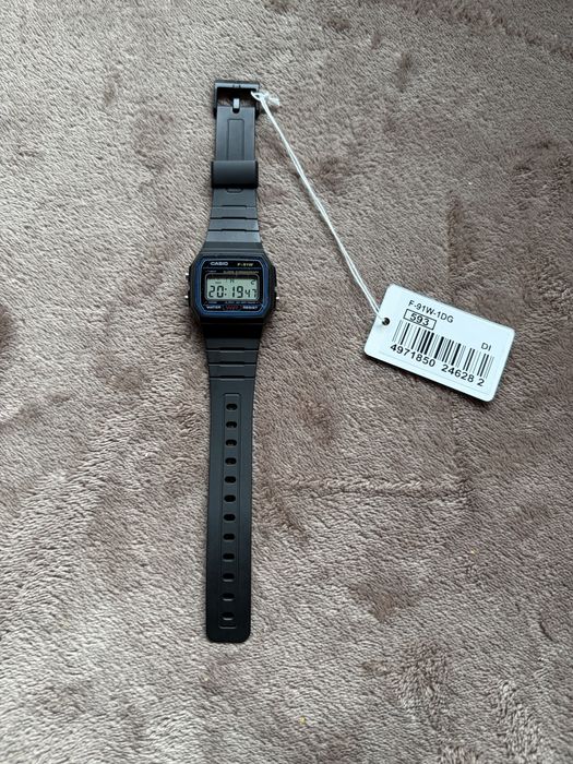 Nowy zegarek Casio F-91W-1DG – kultowy klasyk + puszka i instrukcja